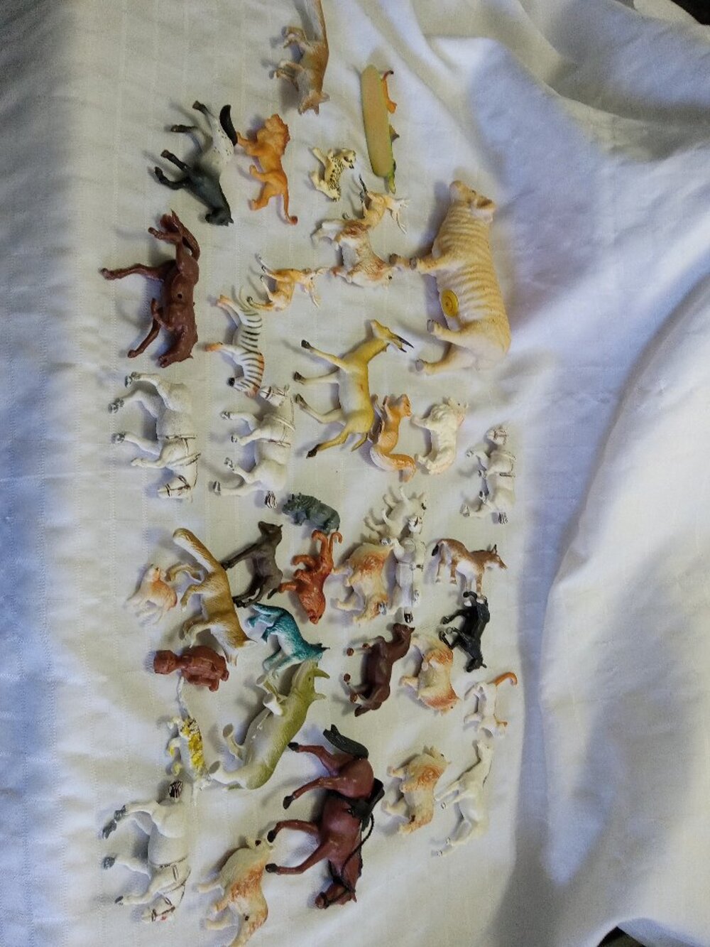 Vintage set of farm, forest, and savanna toys animals